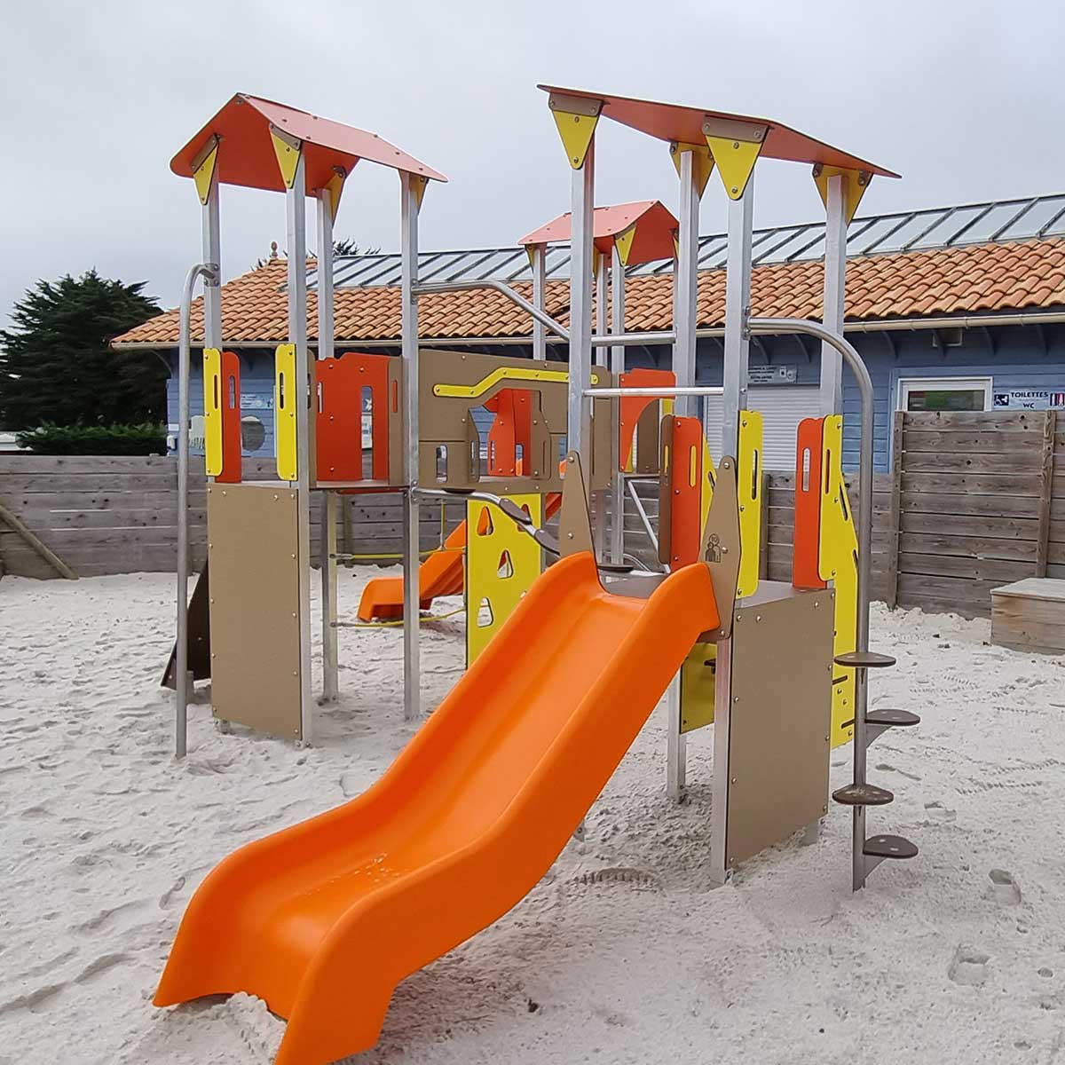 Play structure with brightly colored 3-tower slide